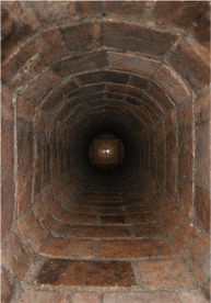 Clean brick chimney flue after sweeping